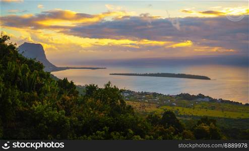 View from Piton de la Petite Riviere Noire, highest peak of Mauritius. Panorama at sunset.Le Morn Brabant on background.