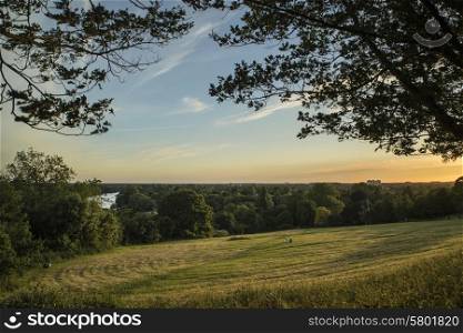 View from Richmond Hill in London over landscape during Summer sunset