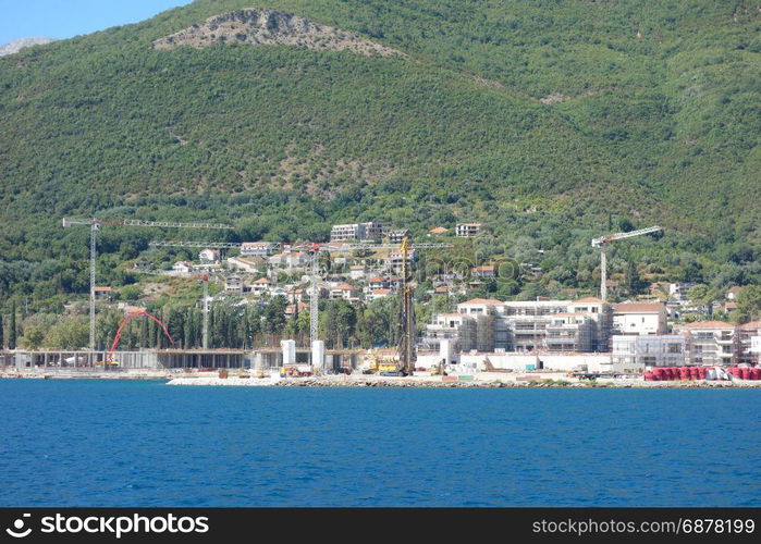 view from sea on building site