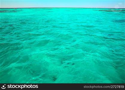 view from ship on turquoise sea water surface background