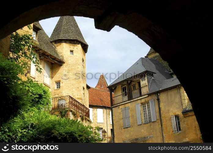 View from the arch in medieval town of Sarlat, France