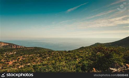 View from the Greek mountains on beautiful landscape above the sea level, horizon look during sunny summertime weather.. View from hills in Greece