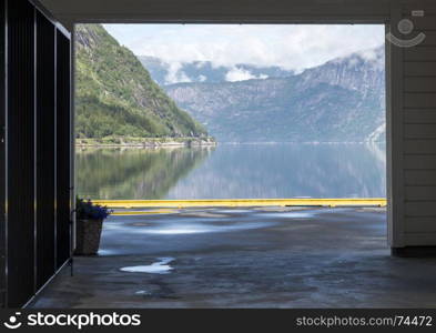 view from the jetty on the eidfjord in norway in summer