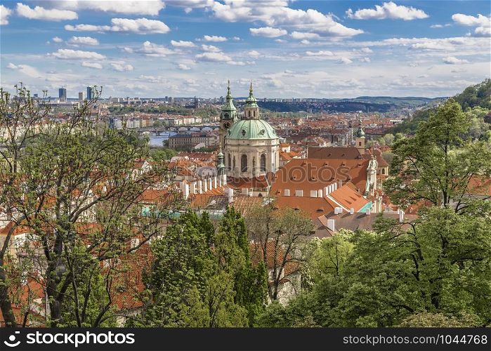 View from the old royal palace in Prague on the city and the Church of St. Nicholas. Prague. Czech Republic