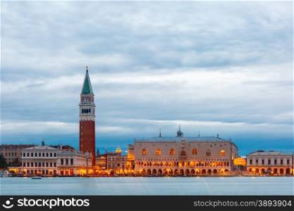 View from the sea to Venice with Campanile di San Marco, Doges Palace and Ponte dei Sospiri Illuminated at evening, Italia