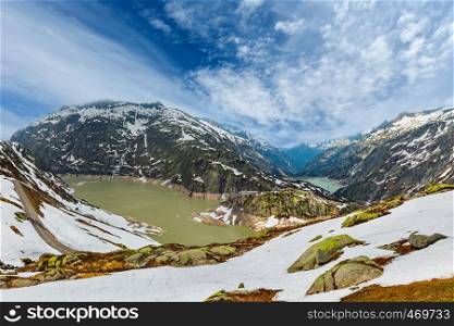 View from the summit of the Grimsel pass looking north over the Raterichsbodensee, Switzerland, Bernese Alps