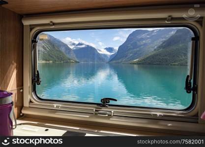 View from the window of the motorhome RV Caravan on the beautiful nature of Norway. lovatnet lake Lodal valley.