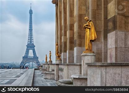 view from Trocadero with golden statues on Eiffel tower, Paris
