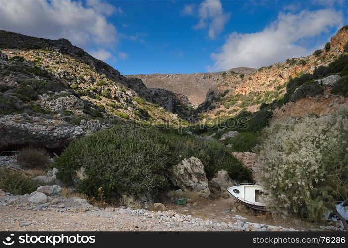 View in the mountains west of Crete . View in the mountains west of Crete with an old boat sleeping on the ground
