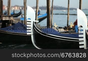 View in Venice, with gondolas mooring in front of Saint Mark square