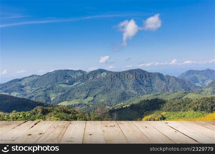 view mountain and blue sky with wood table