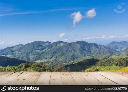 view mountain and blue sky with wood table