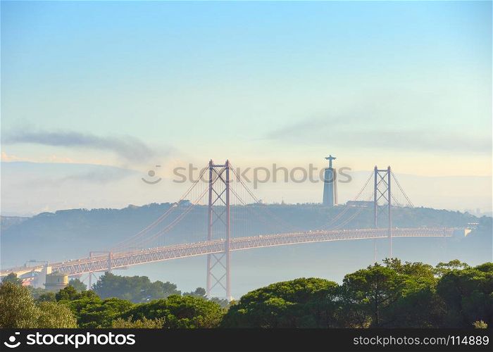 View of 25 April bridge and Christ the Kingmonument. Lisbon, Portugal