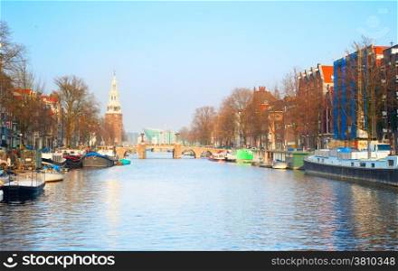 View of a Amsterdam canal at sunset. Netherlands