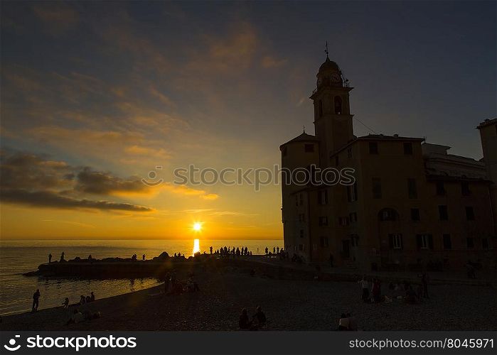 View of a church of a maritime town at sunset