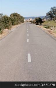 View of a country road in broken stripes