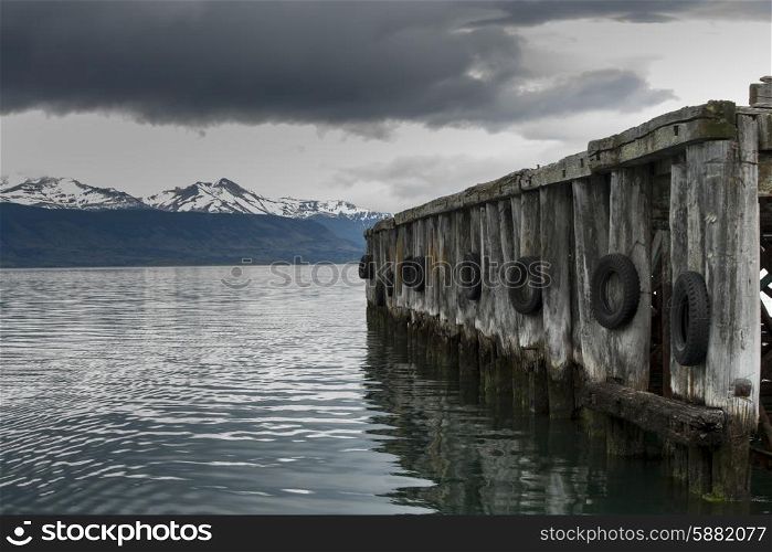 View of a jetty at lake, Golfo Almirante Montt, Puerto Natales, Patagonia, Chile