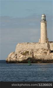 View of a lighthouse on the seafront, Havana, Cuba