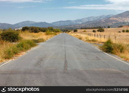 View of a secondary road with many cracks