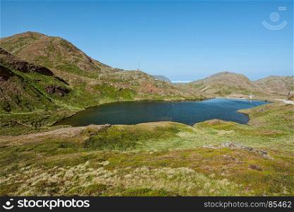 View of a small lake near Honningsvag, Norway. Honningsvag in Norway