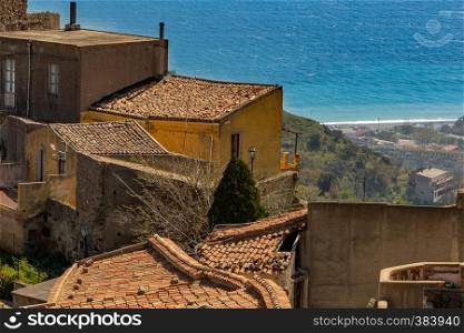 View of a small Sicilian village. With the sea in the background