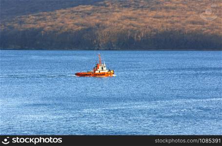 View of a small tugboat in the sea