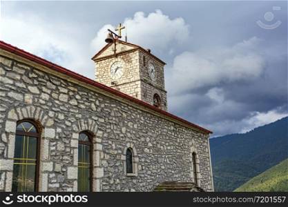View of a stone traditional church in Evrytania, Greece. Stone traditional church in Evrytania, Greece