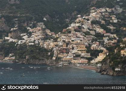 View of a town at coast, Laurito, Amalfi Coast, Salerno, Campania, Italy