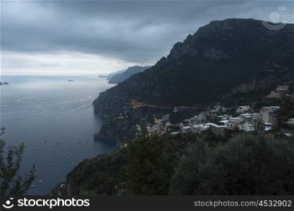 View of a town at coast, Montepertuso, Positano, Amalfi Coast, Salerno, Campania, Italy