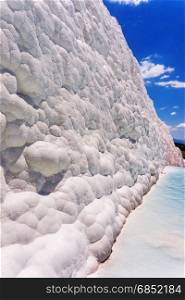 View of a white calcareous wall in Pamukkale