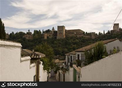 View of Alhambra and rooftops of Albaicin, Albayzin, Granada, Andalusia, Spain