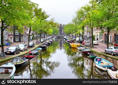 View of Amsterdam canal with boats