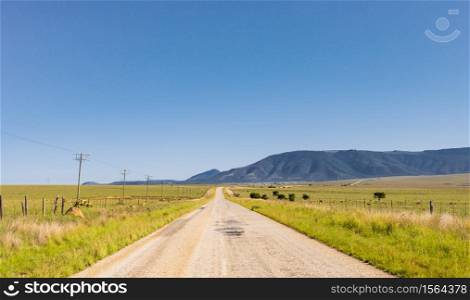 View of an empty country highway road in South African Farmland region