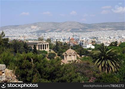 View of ancient Byzantine church and temple of Hephaestus in Agora in Athens, Greece
