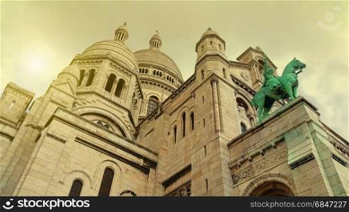 View of Basilica Sacre Coeur, Roman Catholic Church and minor basilica, dedicated to Sacred Heart of Jesus, Paris, France