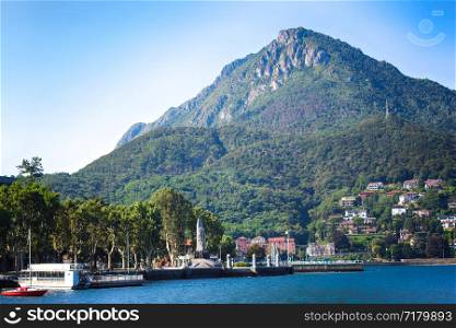 view of beautiful cityscape in Alps with Como Lake in Lecco town