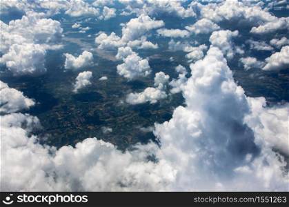 View of beautiful heaven cloudscape from flying plane window.