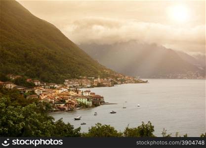 View of beautiful italian village on Como lake in sunlight