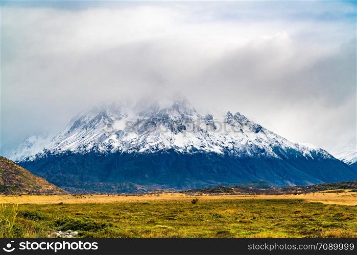 View of beautiful snow capped mountain in Torres del Paine National Park in Chilean Patagonia, Chile