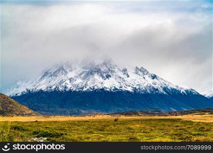 View of beautiful snow capped mountain in Torres del Paine National Park in Chilean Patagonia, Chile
