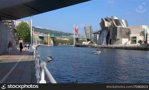 View of Bilbao Guggenheim from under a nearby bridge