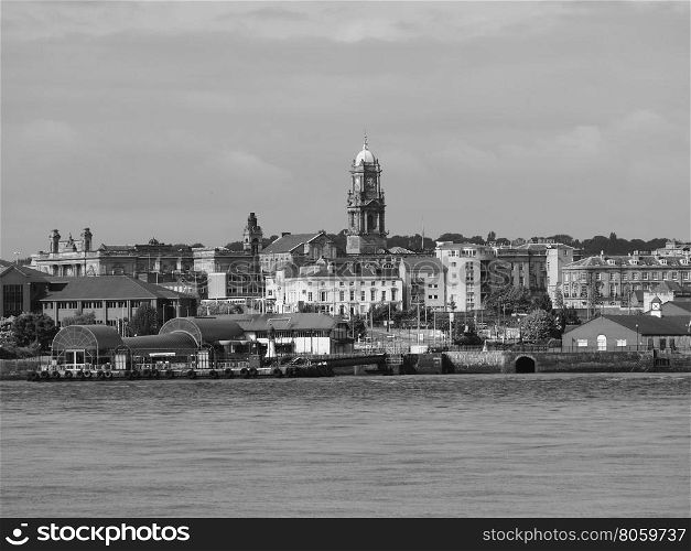 View of Birkenhead in Liverpool. View of Birkenhead skyline across the Mersey river in Liverpool, UK in black and white