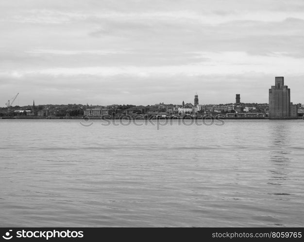 View of Birkenhead in Liverpool. View of Birkenhead skyline across the Mersey river in Liverpool, UK in black and white