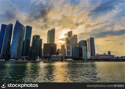 view of central business district building of Singapore city at sunset