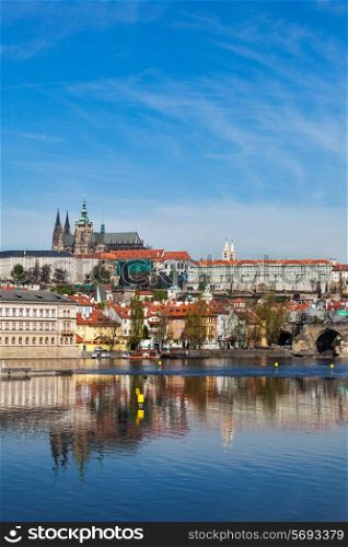 View of Charles bridge over Vltava river and Gradchany Prague Castle and St. Vitus Cathedral