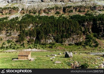 View of Circo de Soaso and shepherd hut, Ordesa National Park, Aragon. Pyrenees Mountains, Spain