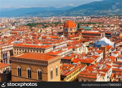 View of city rooftops and Medici Chapel at morning from Palazzo Vecchio in Florence, Tuscany, Italy