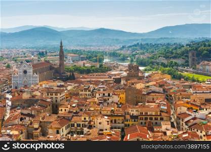 View of city rooftops, Basilica of the Holy Cross and river Arno, at morning from Palazzo Vecchio in Florence, Tuscany, Italy