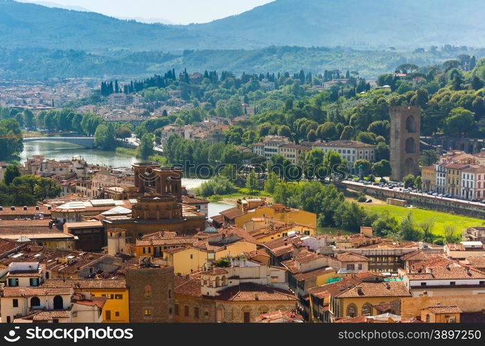 View of city rooftops, Basilica of the Holy Cross and river Arno, at morning from Palazzo Vecchio in Florence, Tuscany, Italy