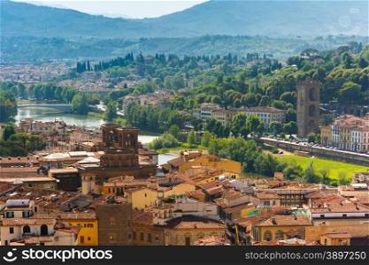 View of city rooftops, Basilica of the Holy Cross and river Arno, at morning from Palazzo Vecchio in Florence, Tuscany, Italy